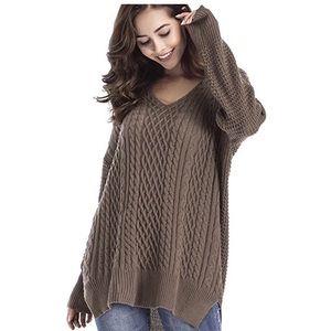 Woman's oversized tunic cable knit sweater